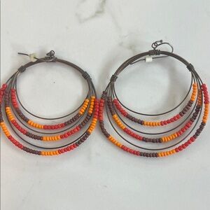 Elegant Beaded Hoop Earrings in Red, Orange, and Brown
